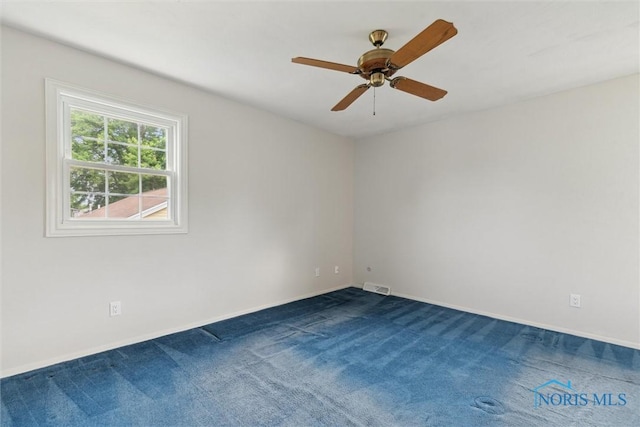 431 Hertford Ct, Maumee, OH 43537 - unfurnished room with dark carpet and ceiling fan
