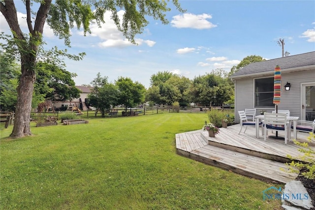 431 Hertford Ct, Maumee, OH 43537 - view of yard featuring a deck and outdoor dining space