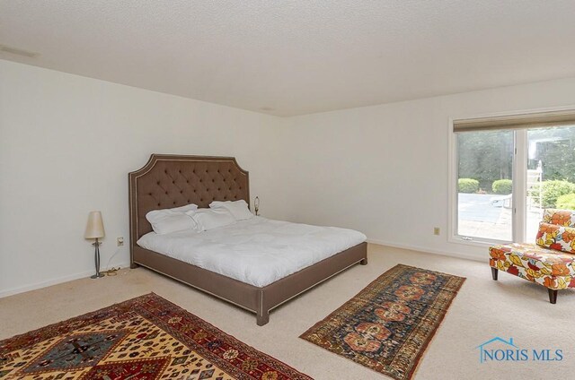 7559 Peachtree Ln, Sylvania, OH 43560 - bedroom featuring carpet floors and baseboards