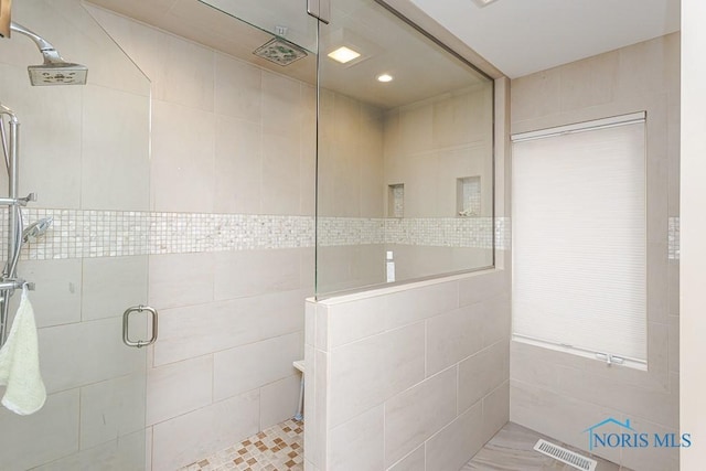 7559 Peachtree Ln, Sylvania, OH 43560 - bathroom with tiled shower and tile walls