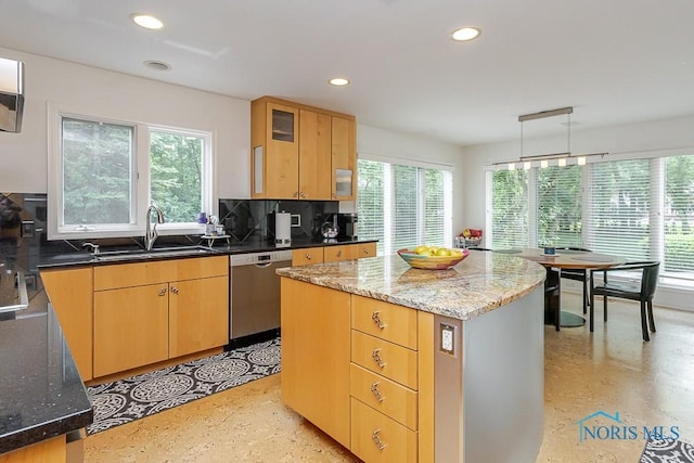 7559 Peachtree Ln, Sylvania, OH 43560 - kitchen with dishwasher, a sink, plenty of natural light, recessed lighting, and decorative backsplash
