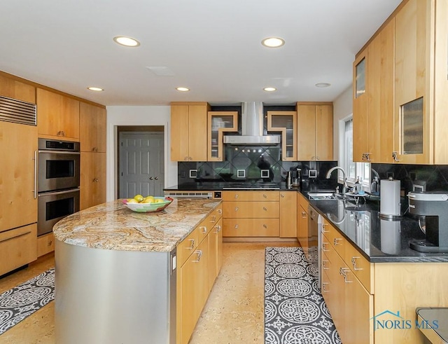 7559 Peachtree Ln, Sylvania, OH 43560 - kitchen with wall chimney exhaust hood, stainless steel appliances, tasteful backsplash, a kitchen island, and dark stone counters