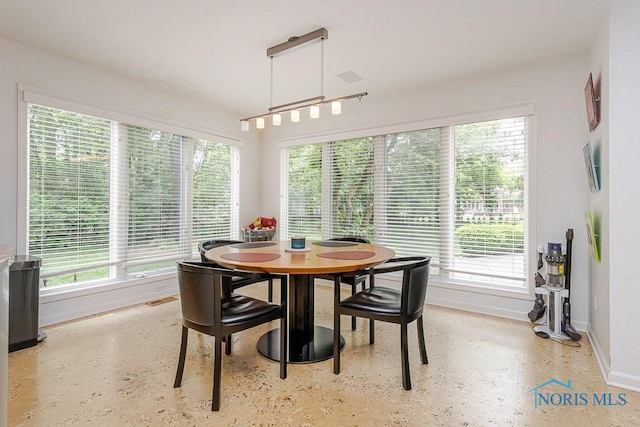 7559 Peachtree Ln, Sylvania, OH 43560 - dining area featuring baseboards