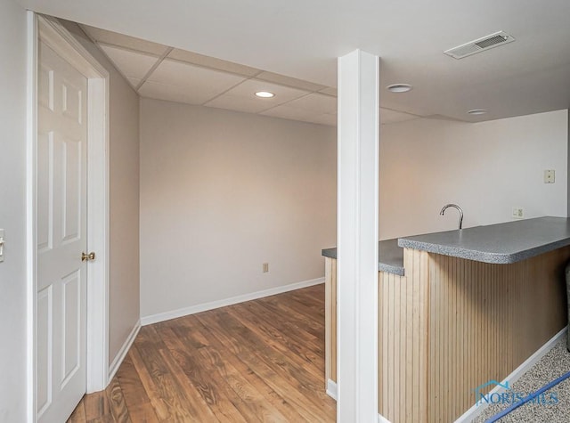 7559 Peachtree Ln, Sylvania, OH 43560 - bar featuring wood finished floors, baseboards, and recessed lighting