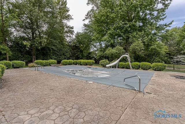 7559 Peachtree Ln, Sylvania, OH 43560 - view of pool with view of wooded area