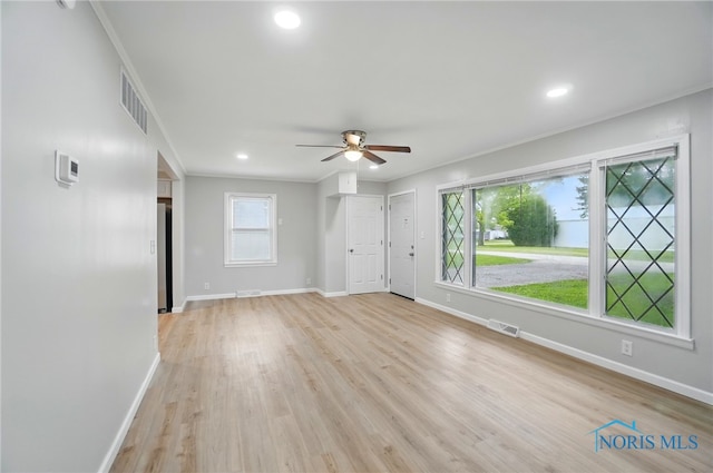 130 Vine St, Risingsun, OH 43457 - spare room with baseboards, a ceiling fan, light wood finished floors, crown molding, and recessed lighting