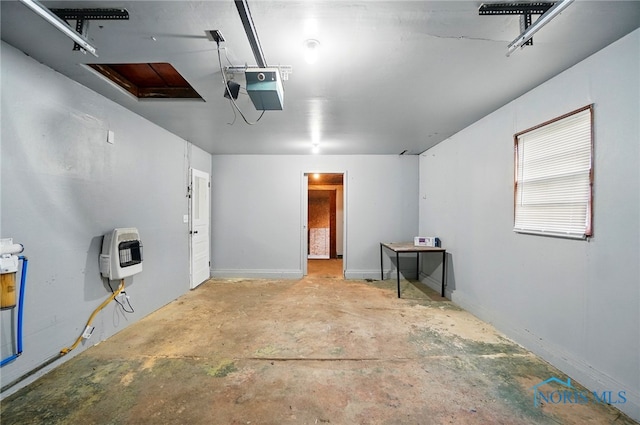 130 Vine St, Risingsun, OH 43457 - garage featuring heating unit and a garage door opener