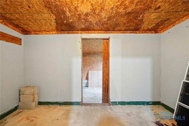 130 Vine St, Risingsun, OH 43457 - unfurnished room featuring baseboards and concrete floors