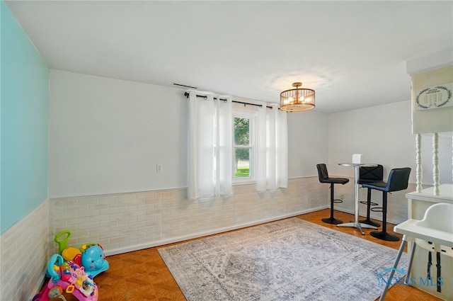 18827 State Route 2, Wauseon, OH 43567 - game room with a wainscoted wall and a chandelier