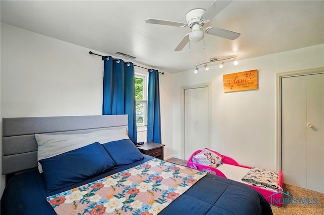 18827 State Route 2, Wauseon, OH 43567 - bedroom featuring rail lighting and a ceiling fan
