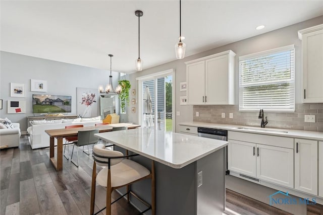 840 Wilkshire Dr, Waterville, OH 43566 - kitchen with a sink, open floor plan, dark wood-type flooring, light countertops, and recessed lighting