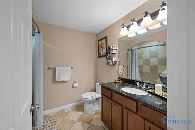 12158 Jefferson St, Perrysburg, OH 43551 - full bath with toilet, vanity, a shower with curtain, tile patterned floors, and baseboards
