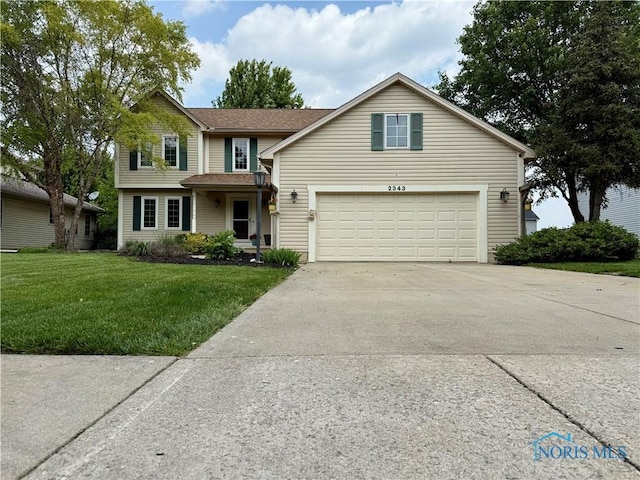 2343 Coe Ct, Perrysburg, OH 43551 - traditional-style home featuring concrete driveway, a front yard, and a garage