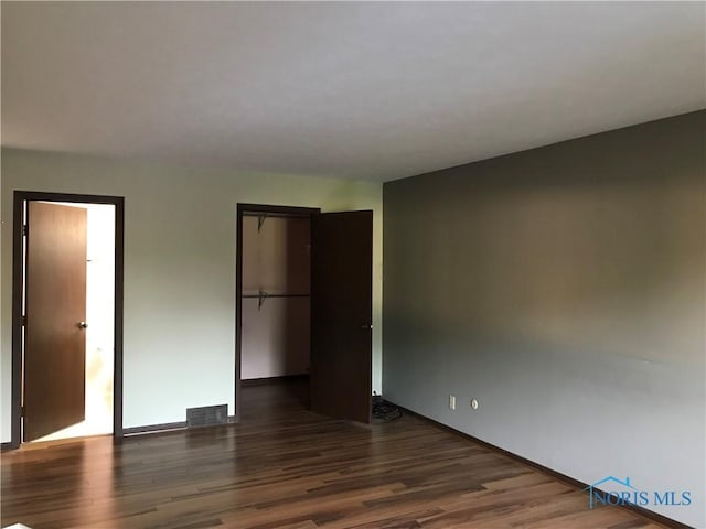 2024 Inglewood Rd, Holland, OH 43528 - unfurnished bedroom with wood finished floors and a closet
