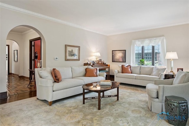 3534 Edgevale Rd, Ottawa Hills, OH 43606 - living room with ornamental molding, light wood-style floors, and arched walkways