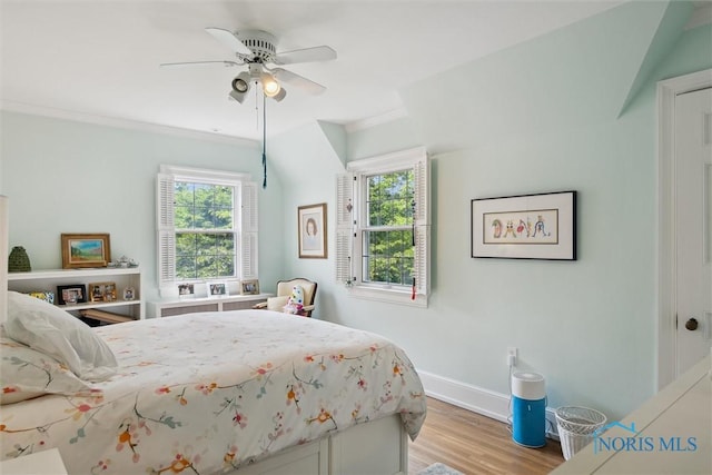 3534 Edgevale Rd, Ottawa Hills, OH 43606 - bedroom featuring light wood finished floors, multiple windows, baseboards, crown molding, and ceiling fan