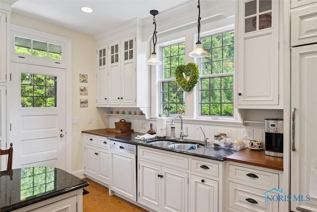 3534 Edgevale Rd, Ottawa Hills, OH 43606 - kitchen featuring dishwasher, a sink, plenty of natural light, glass insert cabinets, and recessed lighting