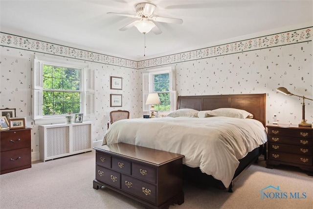 3534 Edgevale Rd, Ottawa Hills, OH 43606 - bedroom featuring wallpapered walls, radiator, carpet floors, and a ceiling fan