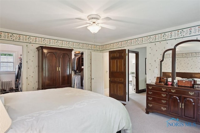 3534 Edgevale Rd, Ottawa Hills, OH 43606 - bedroom with radiator, wallpapered walls, ornamental molding, light colored carpet, and a ceiling fan