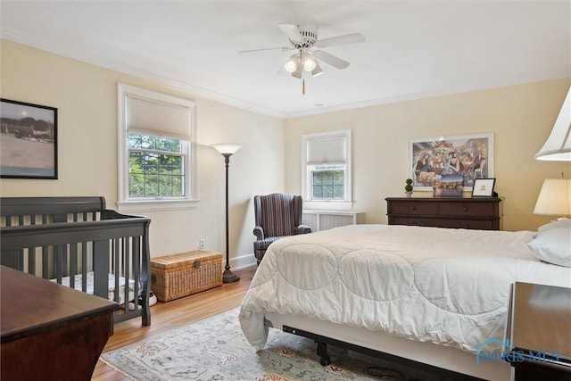 3534 Edgevale Rd, Ottawa Hills, OH 43606 - bedroom with wood finished floors, crown molding, and a ceiling fan
