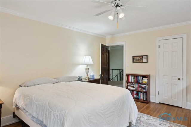 3534 Edgevale Rd, Ottawa Hills, OH 43606 - bedroom featuring ornamental molding, wood finished floors, baseboards, and a ceiling fan