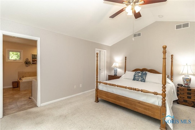 7915 W Bancroft St, Toledo, OH 43617 - carpeted bedroom with vaulted ceiling, baseboards, connected bathroom, and a ceiling fan