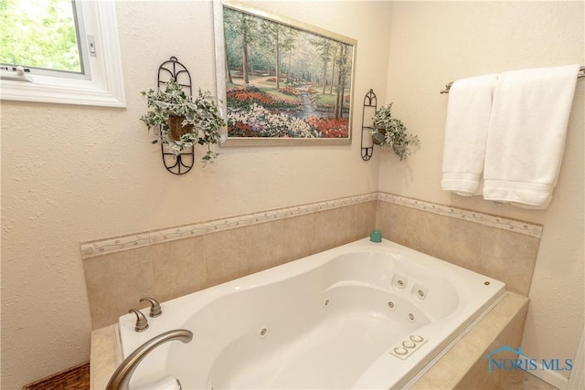 7915 W Bancroft St, Toledo, OH 43617 - bathroom featuring a whirlpool tub