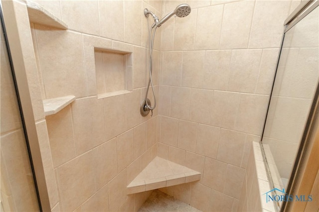 7915 W Bancroft St, Toledo, OH 43617 - full bath with a tile shower and radiator heating unit