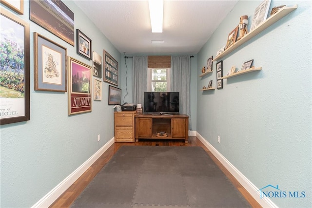 7915 W Bancroft St, Toledo, OH 43617 - office area with dark wood finished floors and baseboards