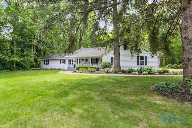 7915 W Bancroft St, Toledo, OH 43617 - single story home with covered porch and a front yard