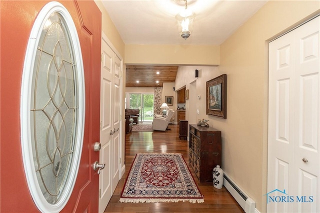 7915 W Bancroft St, Toledo, OH 43617 - entrance foyer featuring a baseboard radiator and wood finished floors