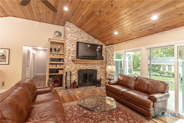 7915 W Bancroft St, Toledo, OH 43617 - living room with wooden ceiling, wood finished floors, a stone fireplace, a ceiling fan, and recessed lighting