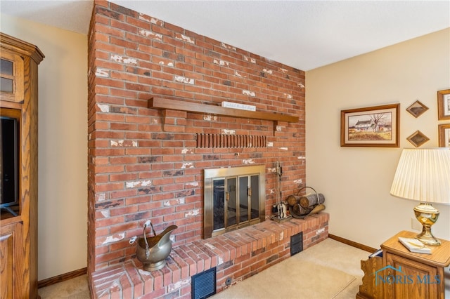 1008 Muirfield Dr, Findlay, OH 45840 - carpeted living room featuring a fireplace and baseboards