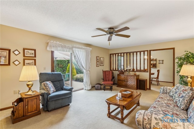 1008 Muirfield Dr, Findlay, OH 45840 - carpeted living room with a ceiling fan and baseboards