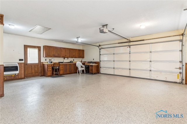 1008 Muirfield Dr, Findlay, OH 45840 - garage with heating unit and a garage door opener