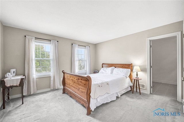 8832 Orchard Lake Rd, Holland, OH 43528 - carpeted bedroom featuring baseboards