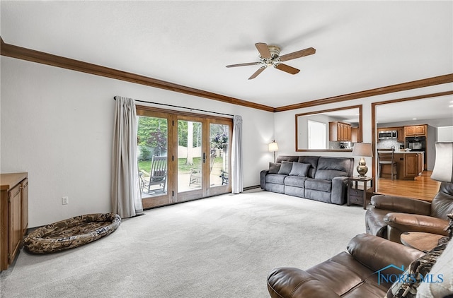 8832 Orchard Lake Rd, Holland, OH 43528 - living room featuring ornamental molding, a ceiling fan, and light carpet