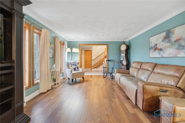 25581 Normandy Rd, Perrysburg, OH 43551 - living area featuring stairs, hardwood / wood-style flooring, baseboards, and crown molding