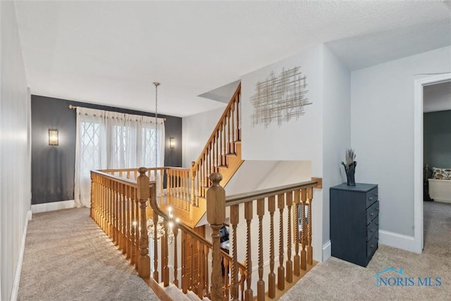 25581 Normandy Rd, Perrysburg, OH 43551 - stairs with carpet floors, a chandelier, and baseboards