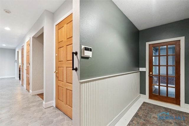 25581 Normandy Rd, Perrysburg, OH 43551 - foyer entrance featuring a wainscoted wall, baseboards, and recessed lighting