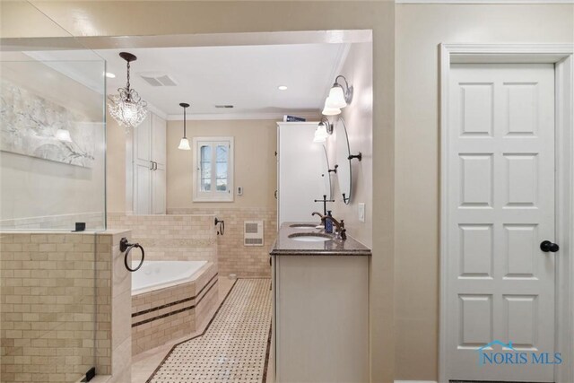 25581 Normandy Rd, Perrysburg, OH 43551 - bathroom featuring a garden tub, double vanity, crown molding, tile patterned flooring, and a shower with door