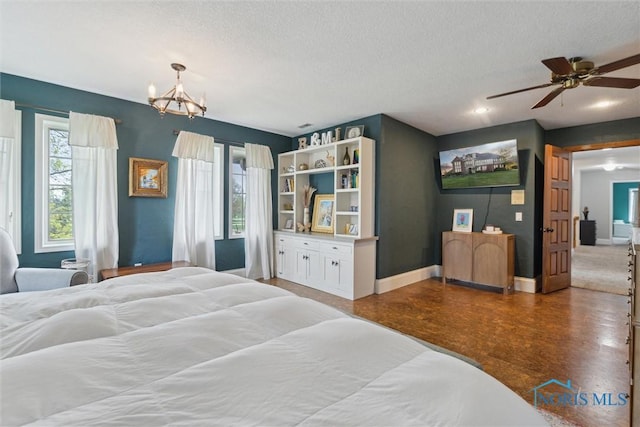 25581 Normandy Rd, Perrysburg, OH 43551 - bedroom featuring a chandelier, a textured ceiling, wood finished floors, baseboards, and recessed lighting