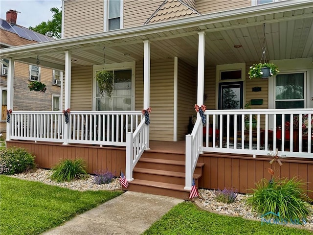 118 N Maple St, Hicksville, OH 43526 - view of exterior entry featuring a porch