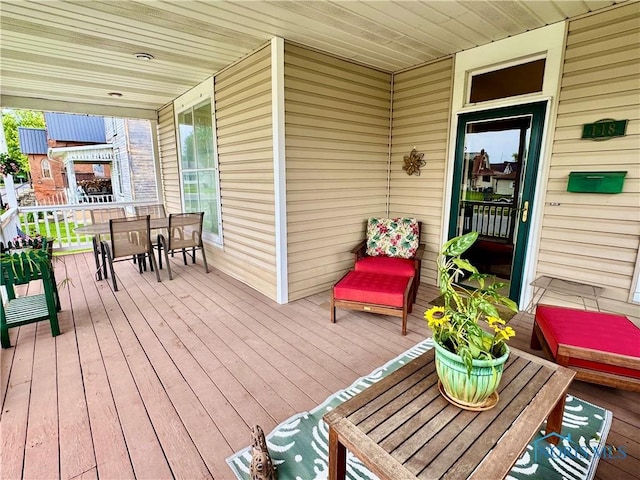 118 N Maple St, Hicksville, OH 43526 - wooden terrace with outdoor dining space
