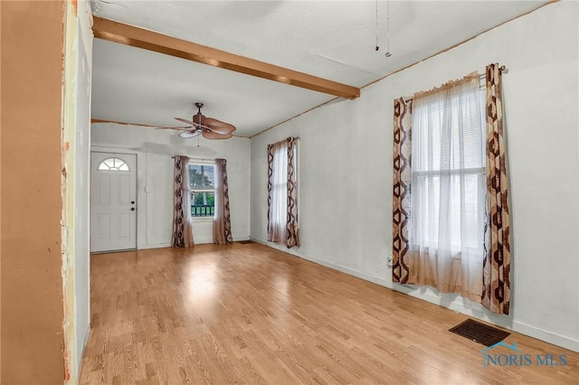 1528 Hirzel St, Toledo, OH 43605 - entryway with beam ceiling, wood finished floors, ceiling fan, and baseboards