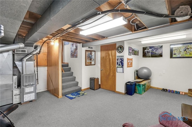 1796 Bucklew Dr, Toledo, OH 43613 - finished below grade area with carpet flooring, stairs, and heating unit