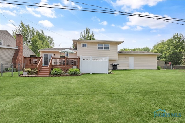 1796 Bucklew Dr, Toledo, OH 43613 - rear view of house with a deck and a fenced backyard