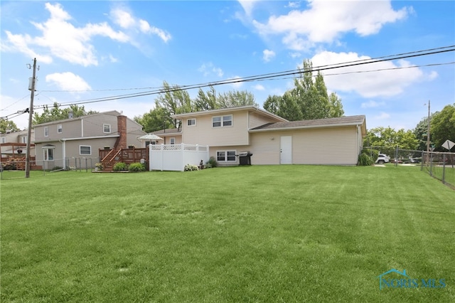 1796 Bucklew Dr, Toledo, OH 43613 - rear view of house featuring a fenced backyard