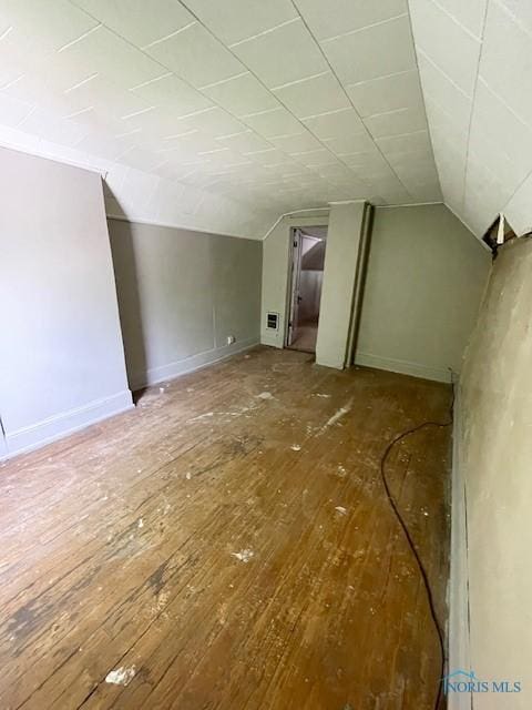 3223 Maple St, Toledo, OH 43608 - bonus room with hardwood / wood-style flooring, vaulted ceiling, and baseboards