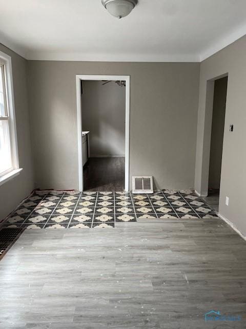 3223 Maple St, Toledo, OH 43608 - spare room with wood finished floors